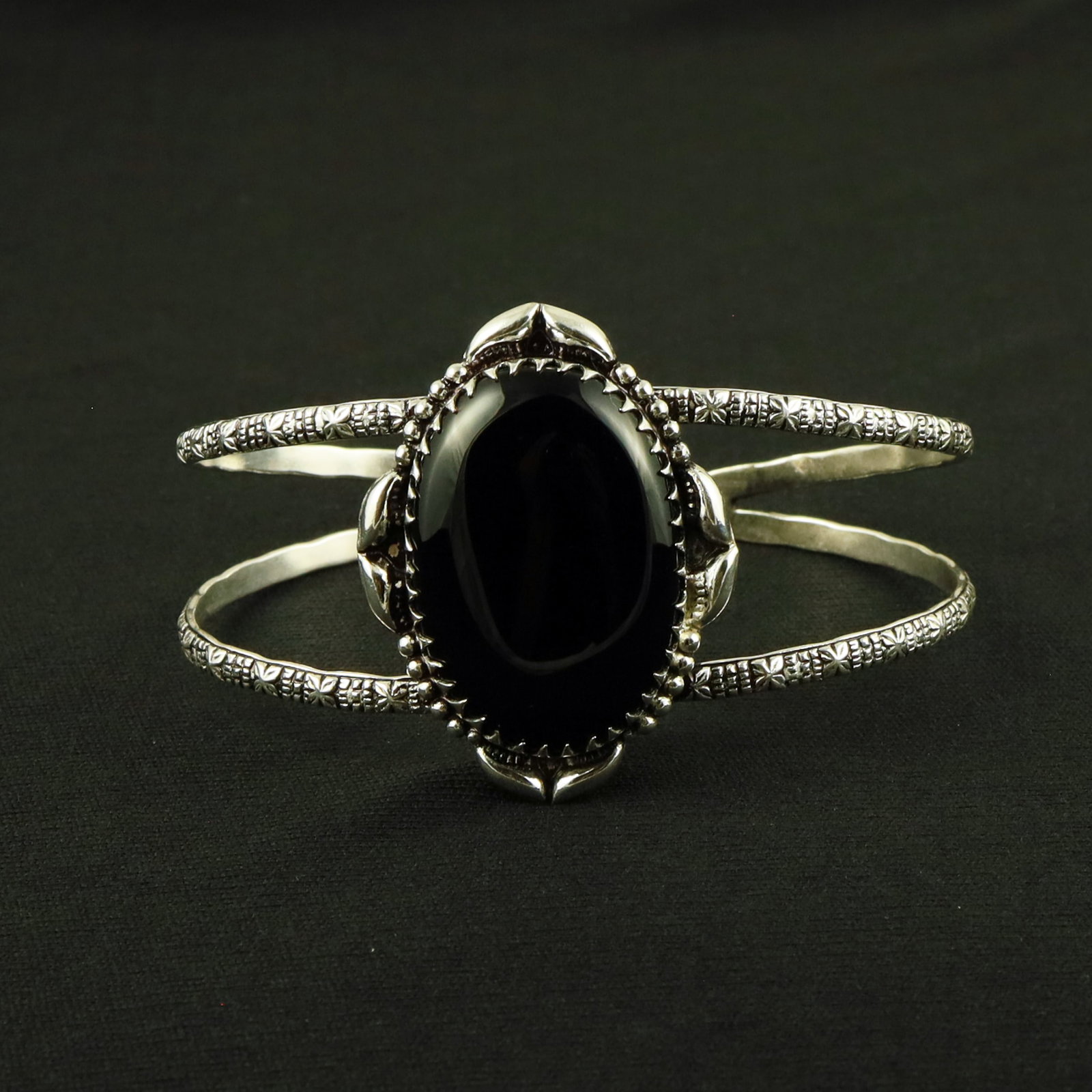 Natural Black Onyx Sterling Silver Plated Handmade Cuff Bangle: Product ID: 260611120856 Product - Handmade Silver Plated Cuff Bangle Metal - 92.5 Sterling Silver Plated Bangle Size - 7.5x5.5 CM (Adjustable) Gemstone - Black Onyx Gemstone Origin - India Gemstone S