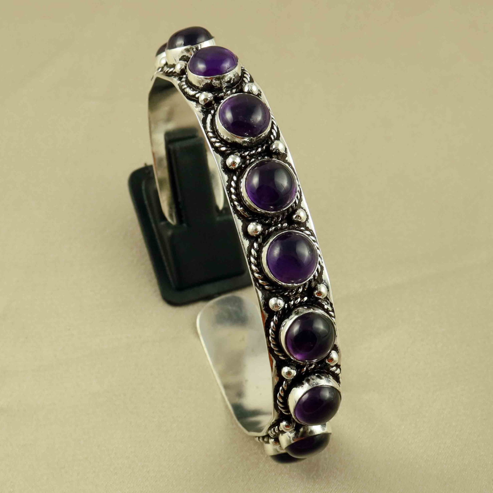 Natural Amethyst Sterling Silver Plated Handmade Cuff Bangle: Product ID: 260607171302 Product - Handmade Silver Plated Cuff Bangle Metal - 92.5 Sterling Silver Plated Bangle Size - 6x5.5 CM (Adjustable) Gemstone - Amethyst Gemstone Origin - Africa Gemstone Size