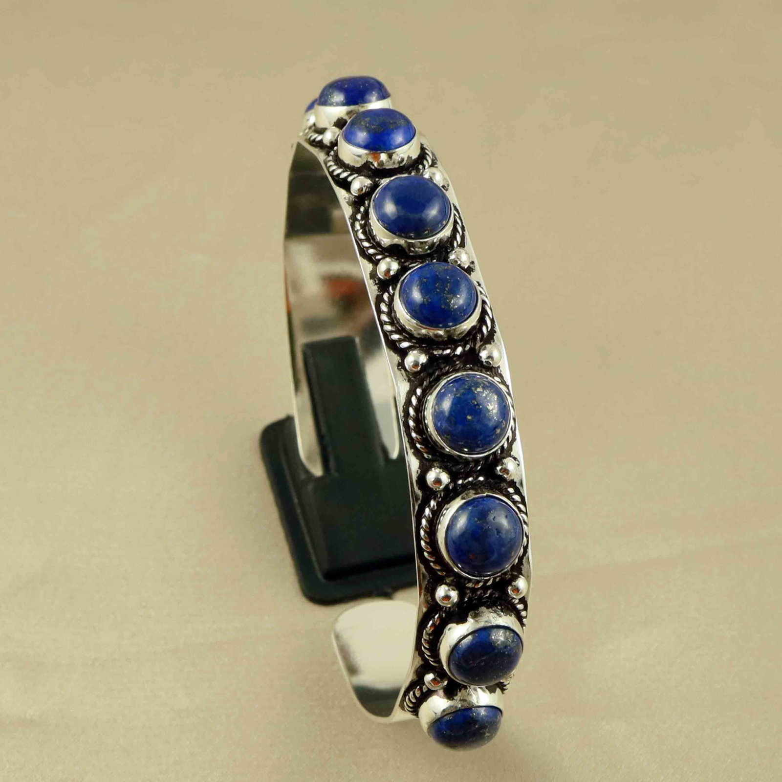 Natural Lapis Lazuli Sterling Silver Plated Handmade Cuff Bangle: Product ID: 260607171231 Product - Handmade Silver Plated Cuff Bangle Metal - 92.5 Sterling Silver Plated Bangle Size - 6x5.5 CM (Adjustable) Gemstone - Lapis Lazuli Gemstone Origin - Afghanistan Gems