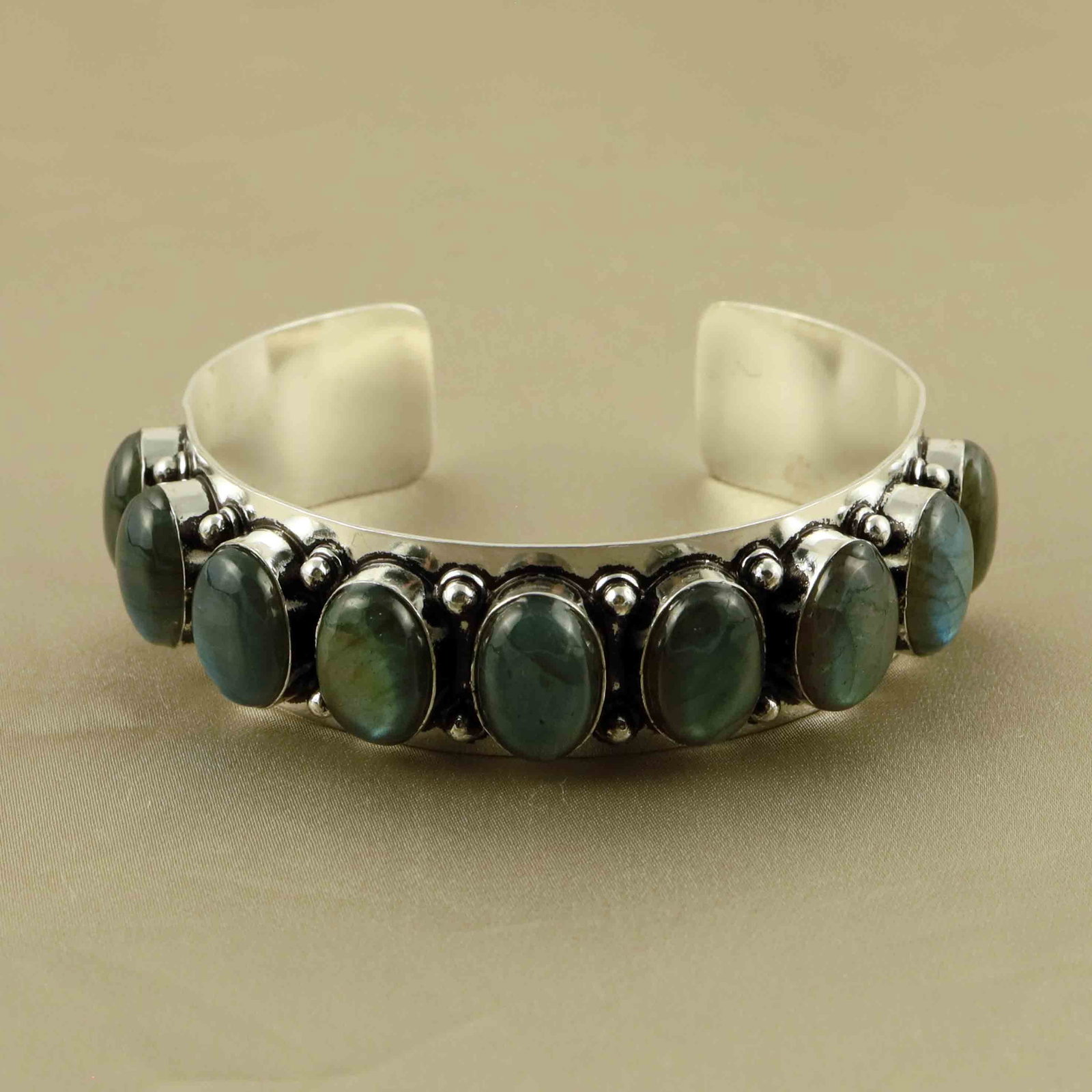 10X14MM Labradorite Silver Plated Handmade Cuff Bangle: Product ID: 260607150847 Product - Handmade Silver Plated Cuff Bangle Metal - 92.5 Sterling Silver Plated Bangle Size - 6.5x5.5 CM (Adjustable) Gemstone - Labradorite Gemstone Origin - Canada Gemstone