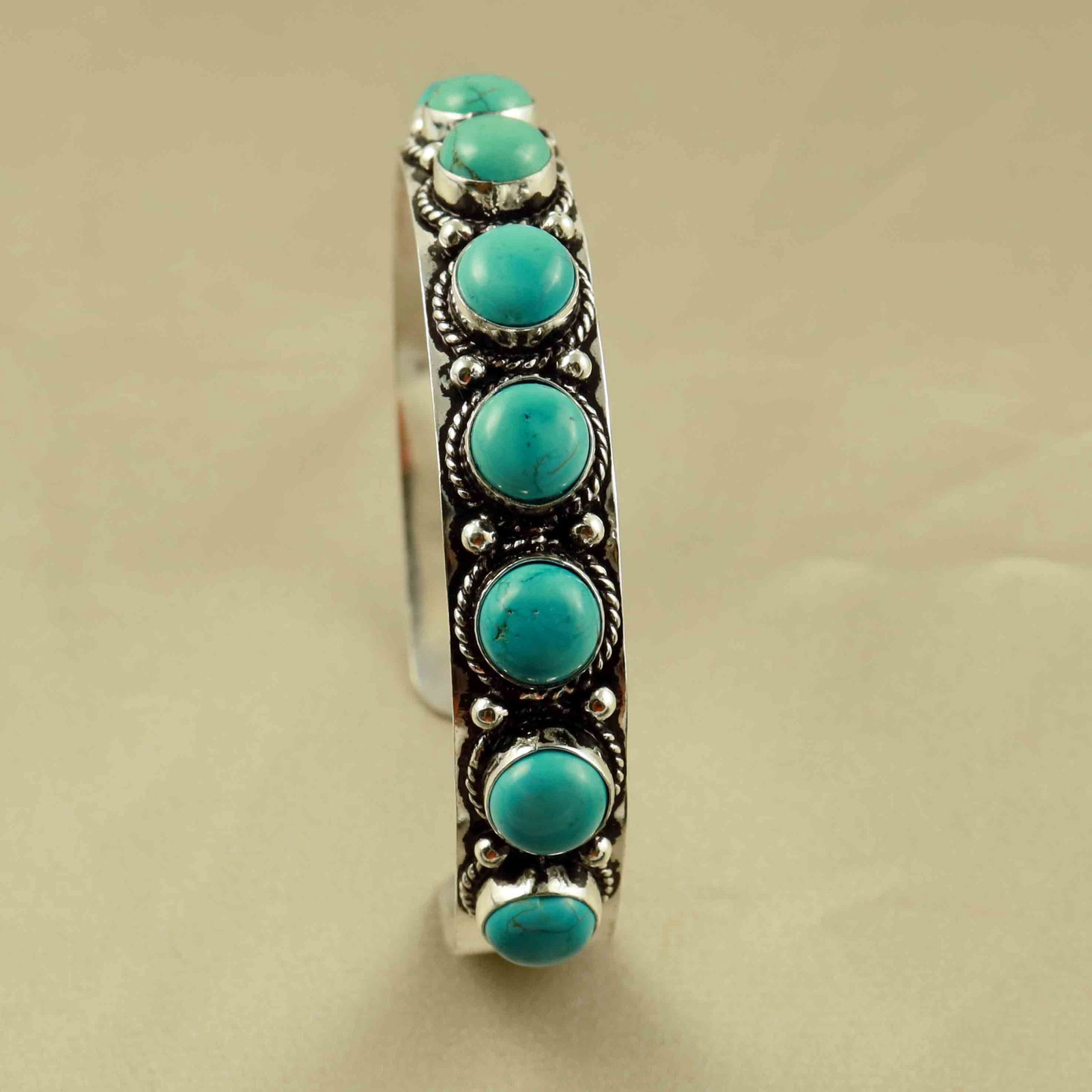 Natural 8MM Turquoise Silver Plated Handmade Cuff Bangle: Product ID: 260607170439 Product - Handmade Silver Plated Cuff Bangle Metal - 92.5 Sterling Silver Plated Bangle Size - 6x5.5 CM (Adjustable) Gemstone - Turquoise Gemstone Origin - Tibet Gemstone Size
