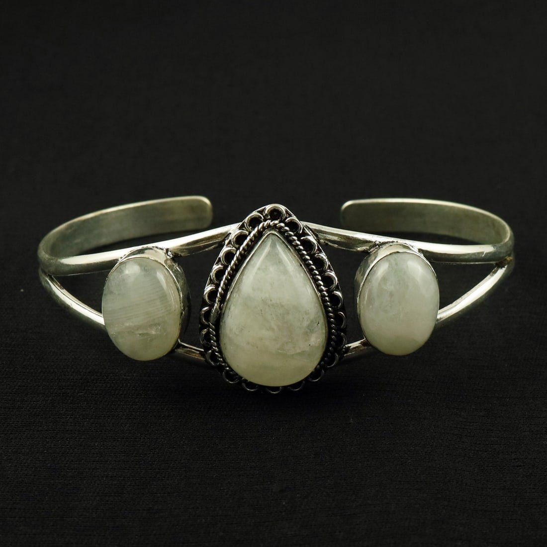 Natural Rainbow Moonstone Silver Plated Handmade Cuff Bangle: Product ID: 260524153442 Product - Handmade Silver Plated Cuff Bangle Metal - 92.5 Sterling Silver Plated Bangle Size - 7.5x5.5 CM (Adjustable) Gemstone - Rainbow Moonstone Gemstone Origin - India Gem
