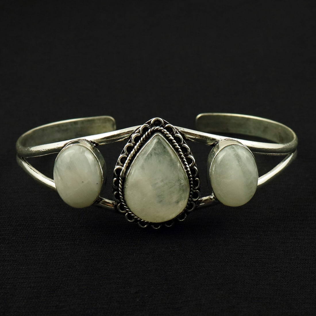 Natural Rainbow Moonstone Silver Plated Handmade Cuff Bangle: Product ID: 260524153532 Product - Handmade Silver Plated Cuff Bangle Metal - 92.5 Sterling Silver Plated Bangle Size - 7.5x5.5 CM (Adjustable) Gemstone - Rainbow Moonstone Gemstone Origin - India Gem