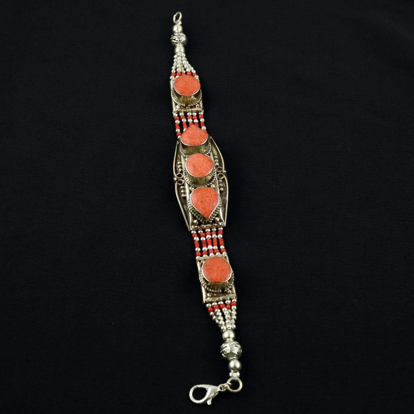 Tibetan Natural Red Coral Handmade Royal Bracelet: Product ID: 260520115609 Product - Tibetan Handmade Ethnic Bracelet Gemstone - Natural Coral Size - 7 Inch Weight - 50 Gram Approx Metal - Brass & Copper mix Metal Origin - Nepal Country/Region of Man
