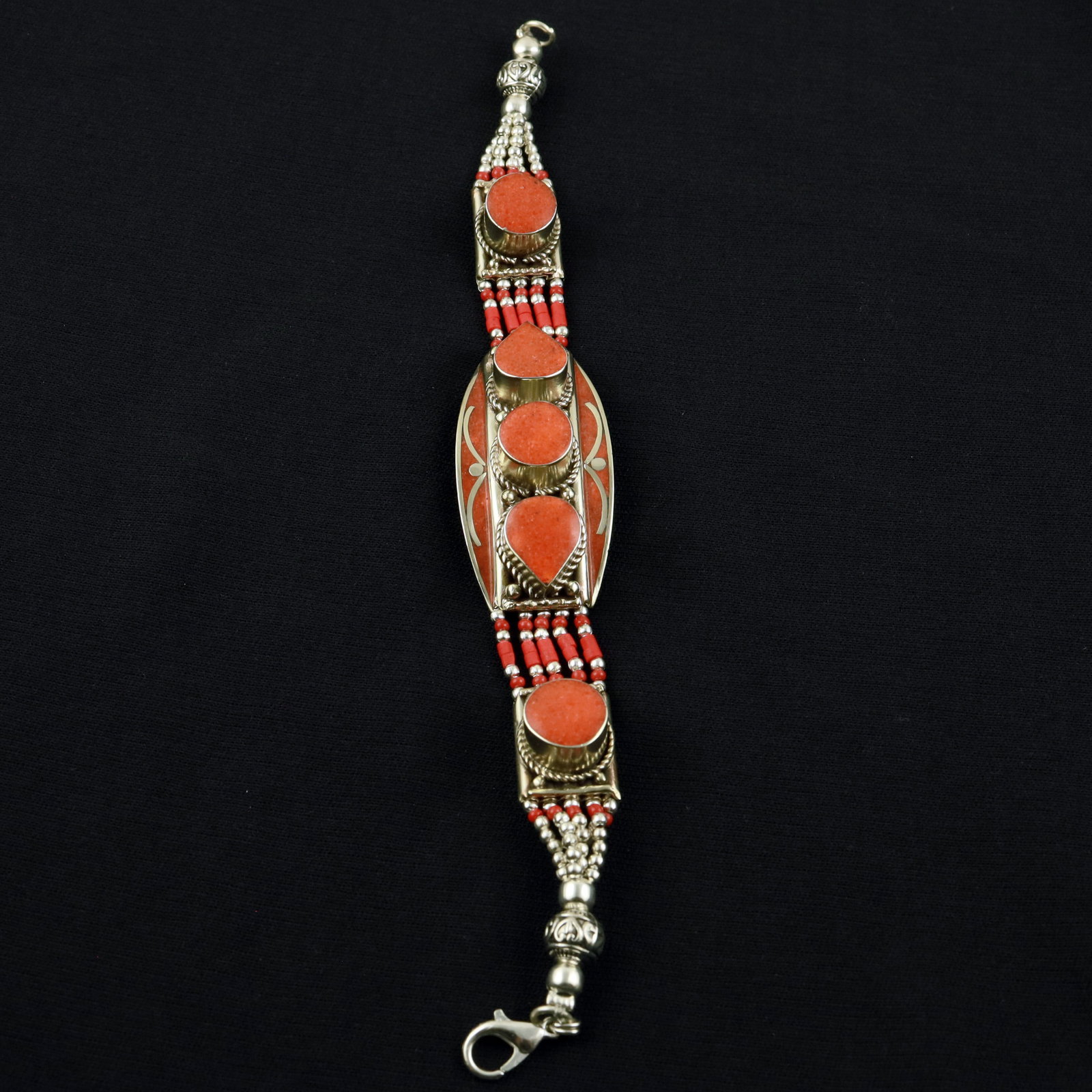 Tibetan Red Coral Handmade Royal Boho Bracelet: Product ID: 260520115257 Product - Tibetan Handmade Ethnic Bracelet Gemstone - Natural Red Coral Size - 7 Inch Weight - 50 Gram Approx Metal - Brass & Copper mix Metal Origin - Nepal Country/Region of