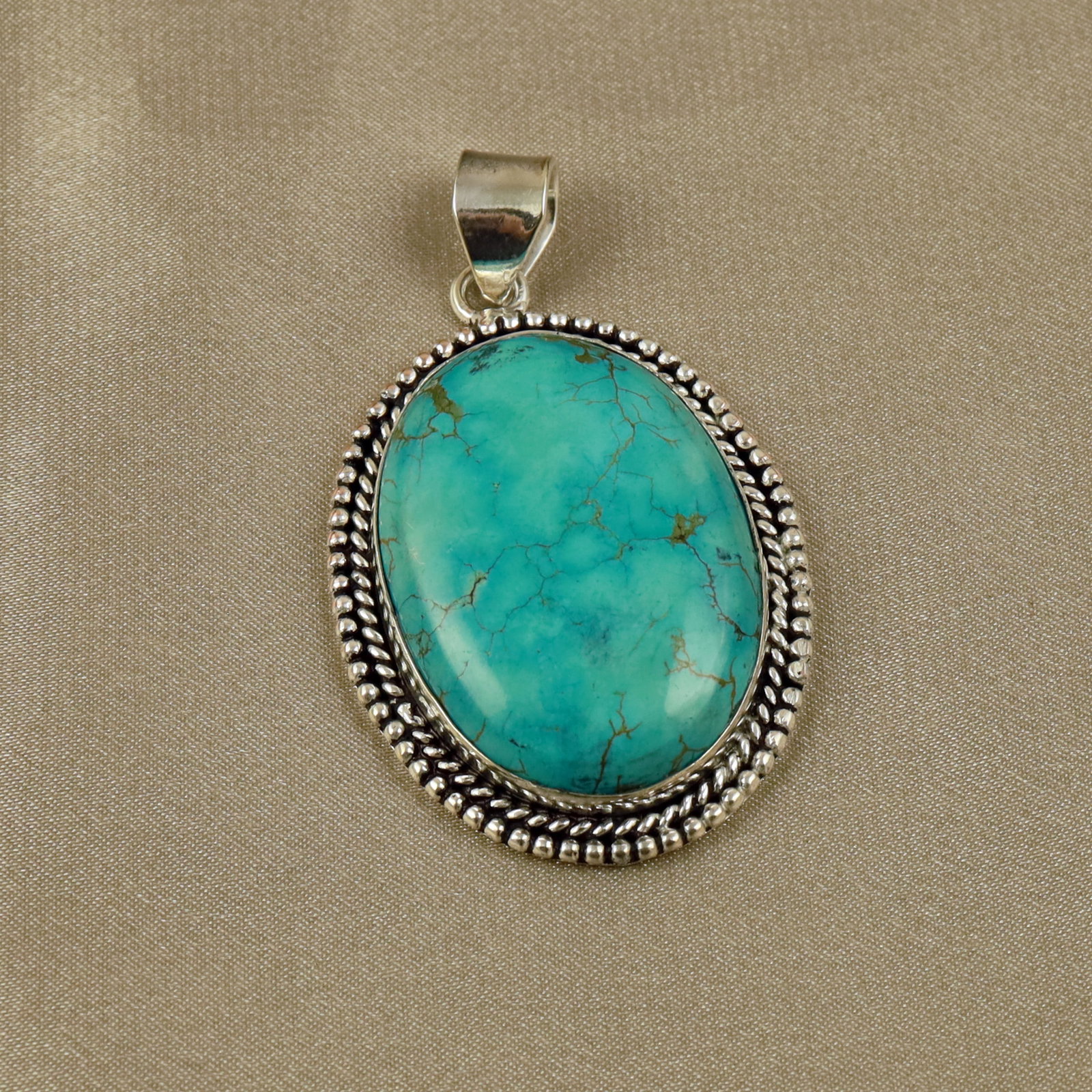 Natural Turquoise Sterling Silver Plated Handmade Pendant: Product ID: 260518134041 Product - Handmade Silver Plated Pendant Metal - 92.5 Sterling Silver Plated Pendant Size - 4x3CM Gemstone - Turquoise Gemstone Origin - Tibet Gemstone Shape - Oval Pendant We