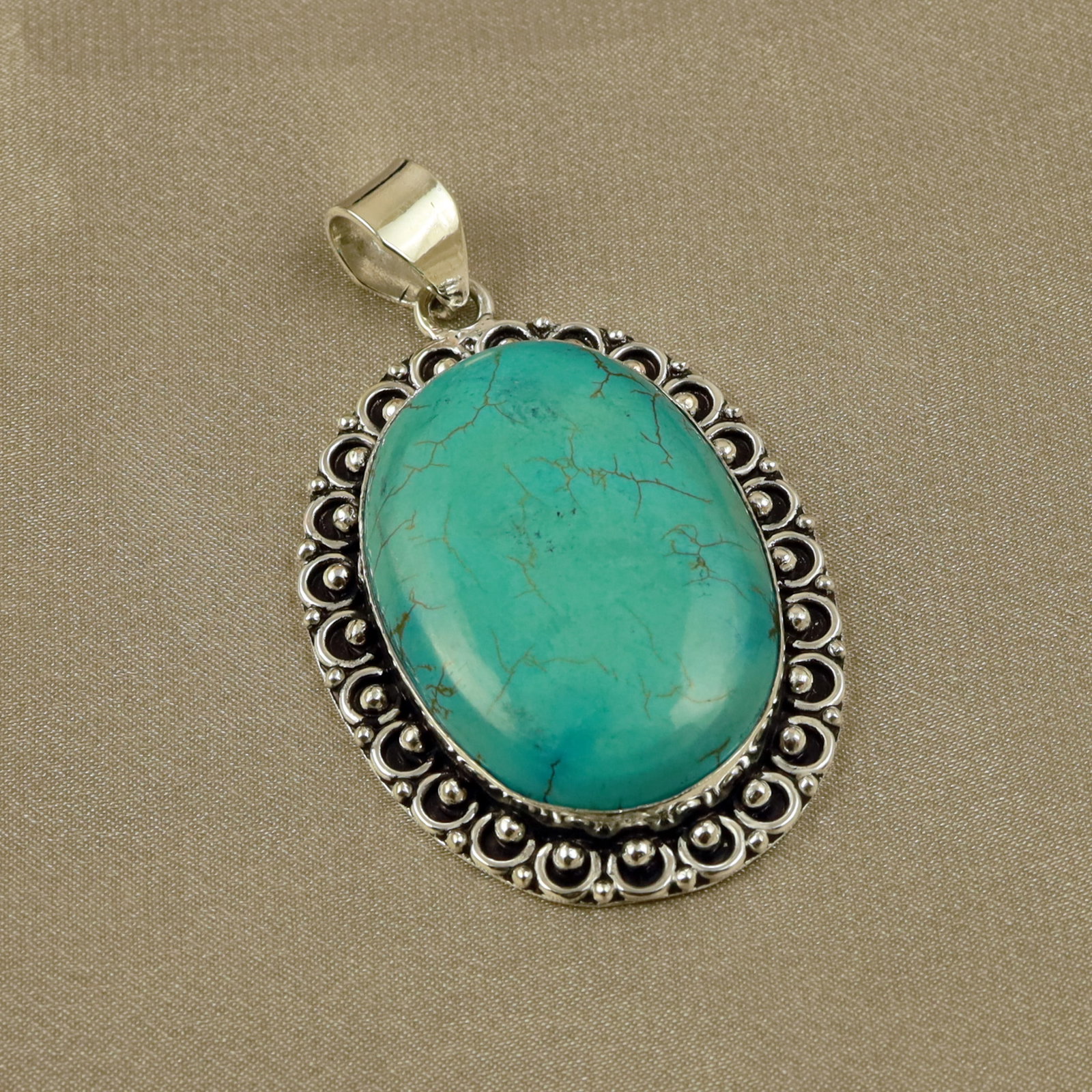 Natural Turquoise Sterling Silver Plated Handmade Pendant: Product ID: 260518133943 Product - Handmade Silver Plated Pendant Metal - 92.5 Sterling Silver Plated Pendant Size - 4.5x3CM Gemstone - Turquoise Gemstone Origin - Tibet Gemstone Shape - Oval Pendant 