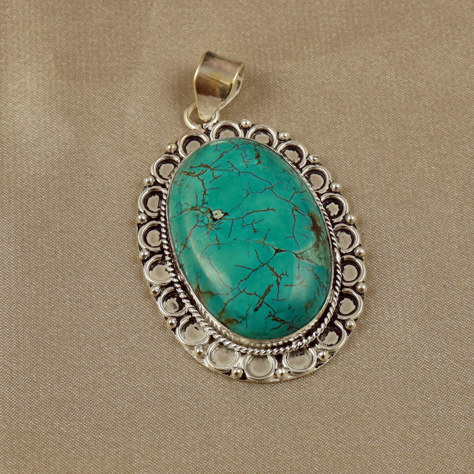 Natural Turquoise Sterling Silver Plated Handmade Pendant: Product ID: 260518133852 Product - Handmade Silver Plated Pendant Metal - 92.5 Sterling Silver Plated Pendant Size - 4.5x3CM Gemstone - Turquoise Gemstone Origin - Tibet Gemstone Shape - Oval Pendant 