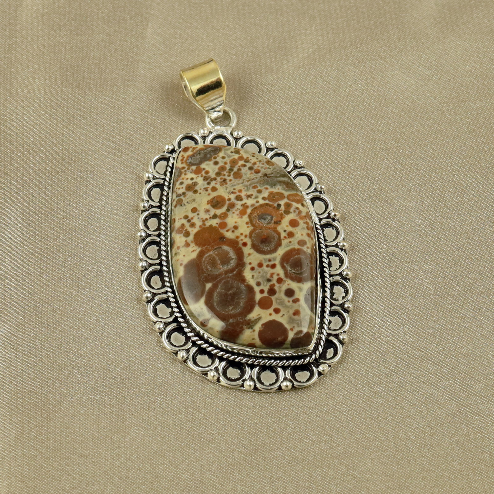 Natural Asteroid Jasper Sterling Silver Plated Handmade Pendant: Product ID: 260518132545 Product - Handmade Silver Plated Pendant Metal - 92.5 Sterling Silver Plated Pendant Size - 5x3.5CM Gemstone - Asteroid Jasper Gemstone Origin - Madagascar Gemstone Shape - Ov