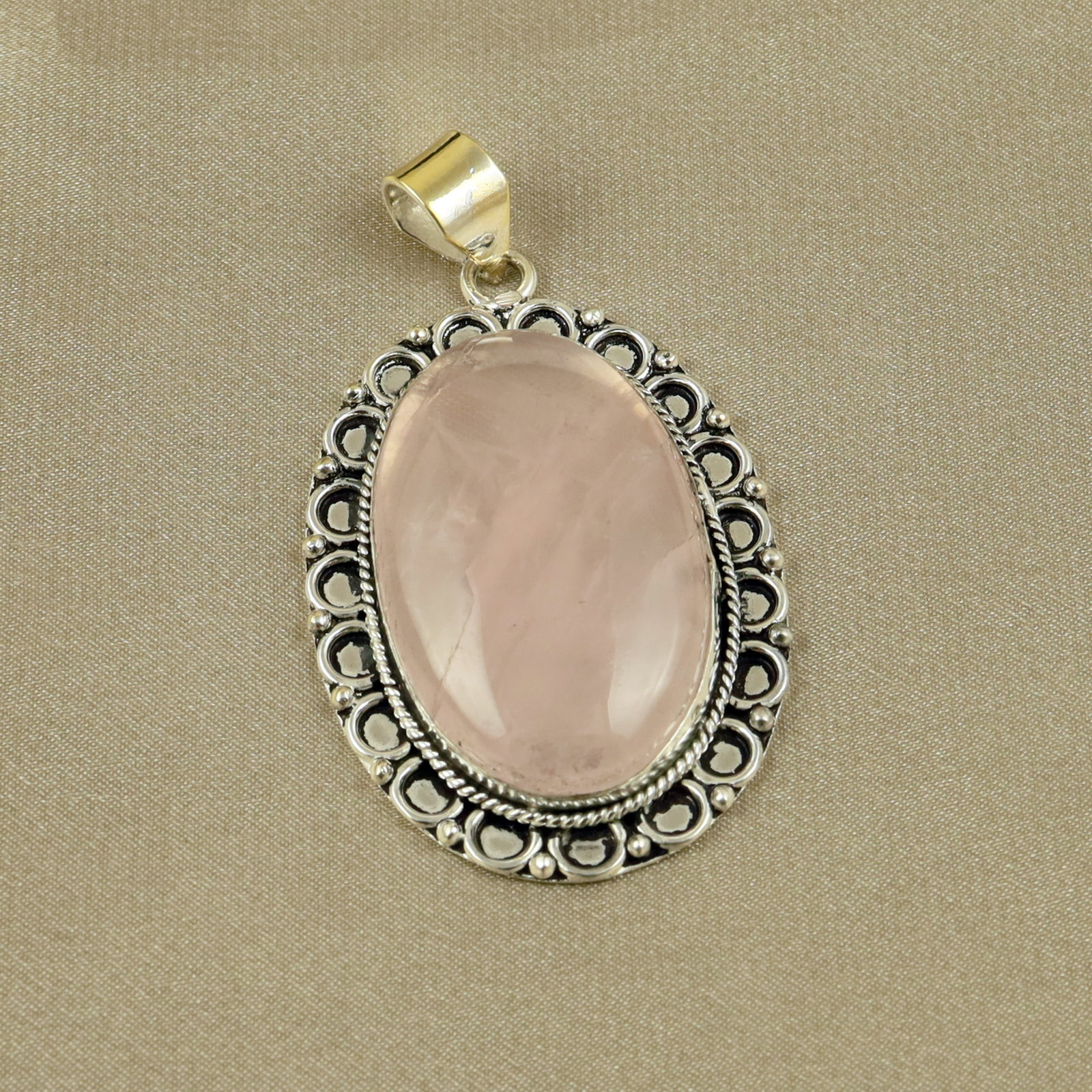 Natural A+ Rose Quartz Sterling Silver Plated Handmade Pendant: Product ID: 260518132233 Product - Handmade Silver Plated Pendant Metal - 92.5 Sterling Silver Plated Pendant Size - 4.5x3CM Gemstone - Rose Quartz Gemstone Origin - Brazil Gemstone Shape - Oval Penda