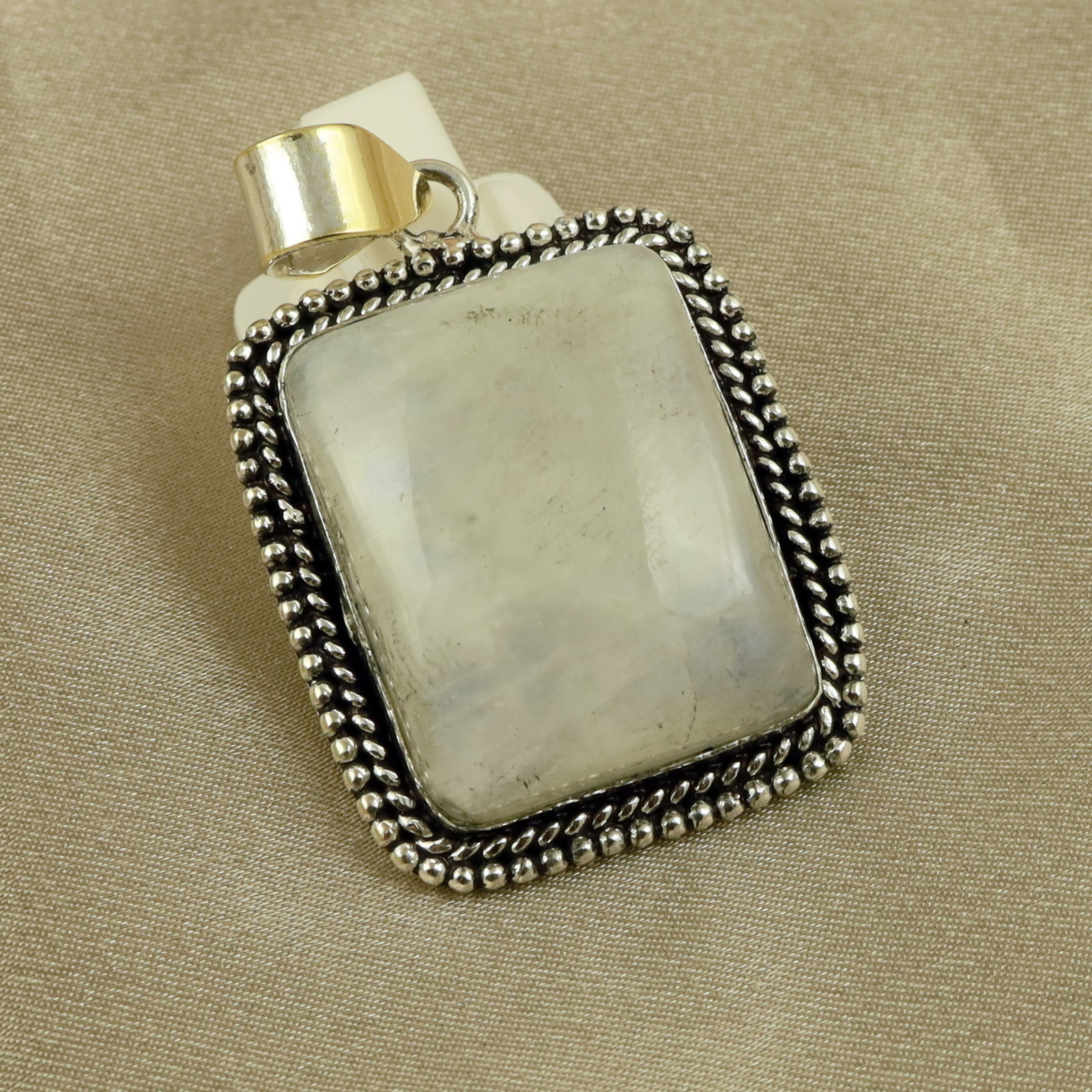 Natural Rainbow Moonstone Sterling Silver Plated Handmade Pendant: Product ID: 260518131547 Product - Handmade Silver Plated Pendant Metal - 92.5 Sterling Silver Plated Pendant Size - 3.5x3CM Gemstone - Rainbow Moonstone Gemstone Origin - India Gemstone Shape - Squar