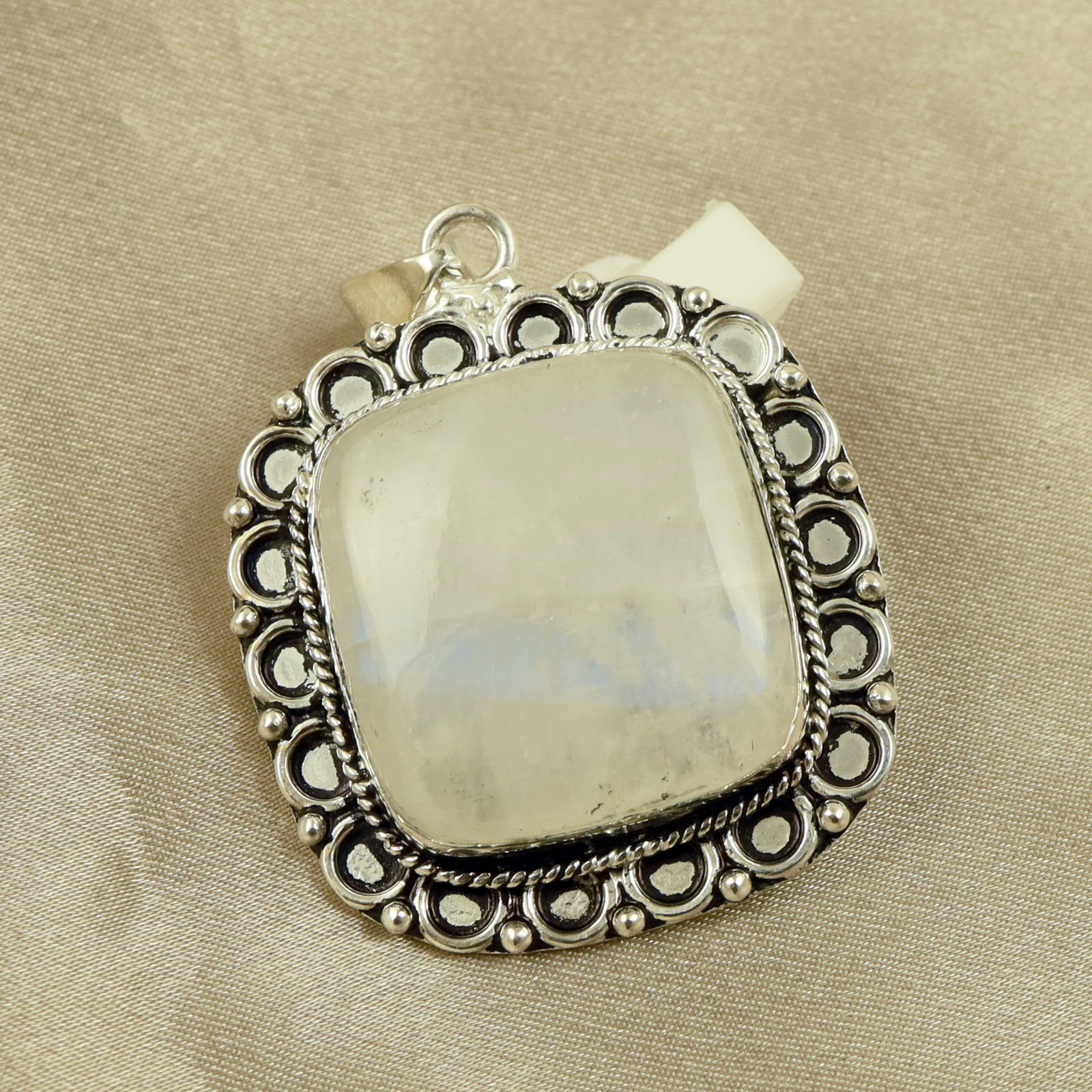 Natural Rainbow Moonstone Sterling Silver Plated Handmade Pendant: Product ID: 260518131430 Product - Handmade Silver Plated Pendant Metal - 92.5 Sterling Silver Plated Pendant Size - 3.5x3.5CM Gemstone - Rainbow Moonstone Gemstone Origin - India Gemstone Shape - Squ