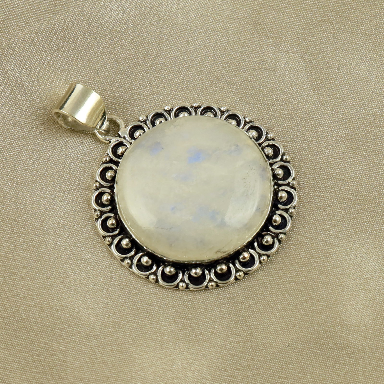 Natural Rainbow Moonstone Sterling Silver Plated Handmade Pendant: Product ID: 260518131317 Product - Handmade Silver Plated Pendant Metal - 92.5 Sterling Silver Plated Pendant Size - 3.5CM Gemstone - Rainbow Moonstone Gemstone Origin - India Gemstone Shape - Round P