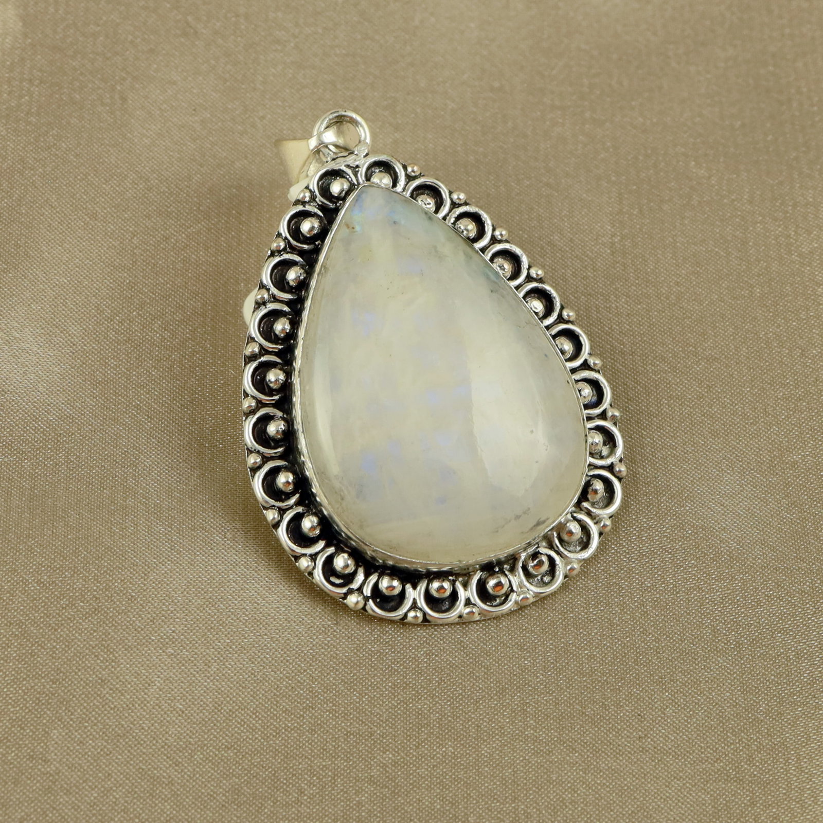 Natural Rainbow Moonstone Sterling Silver Plated Handmade Pendant: Product ID: 260517190213 Product - Handmade Silver Plated Pendant Metal - 92.5 Sterling Silver Plated Pendant Size - 4.5x3.5 CM Gemstone - Rainbow Moonstone Gemstone Origin - India Gemstone Shape - Pe