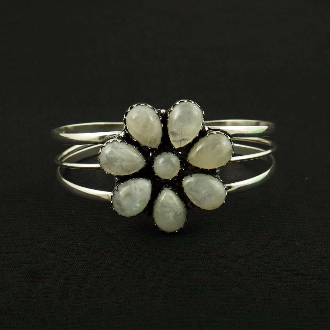 Natural Rainbow Moonstone Sterling Silver Plated Handmade Cuff Bangle: Product ID: 260819180231 Product - Handmade Silver Plated Cuff Bangle Metal - 92.5 Sterling Silver Plated Bangle Size - 7x5 CM (Adjustable) Gemstone - Rainbow Moonstone Gemstone Origin - India Gemston