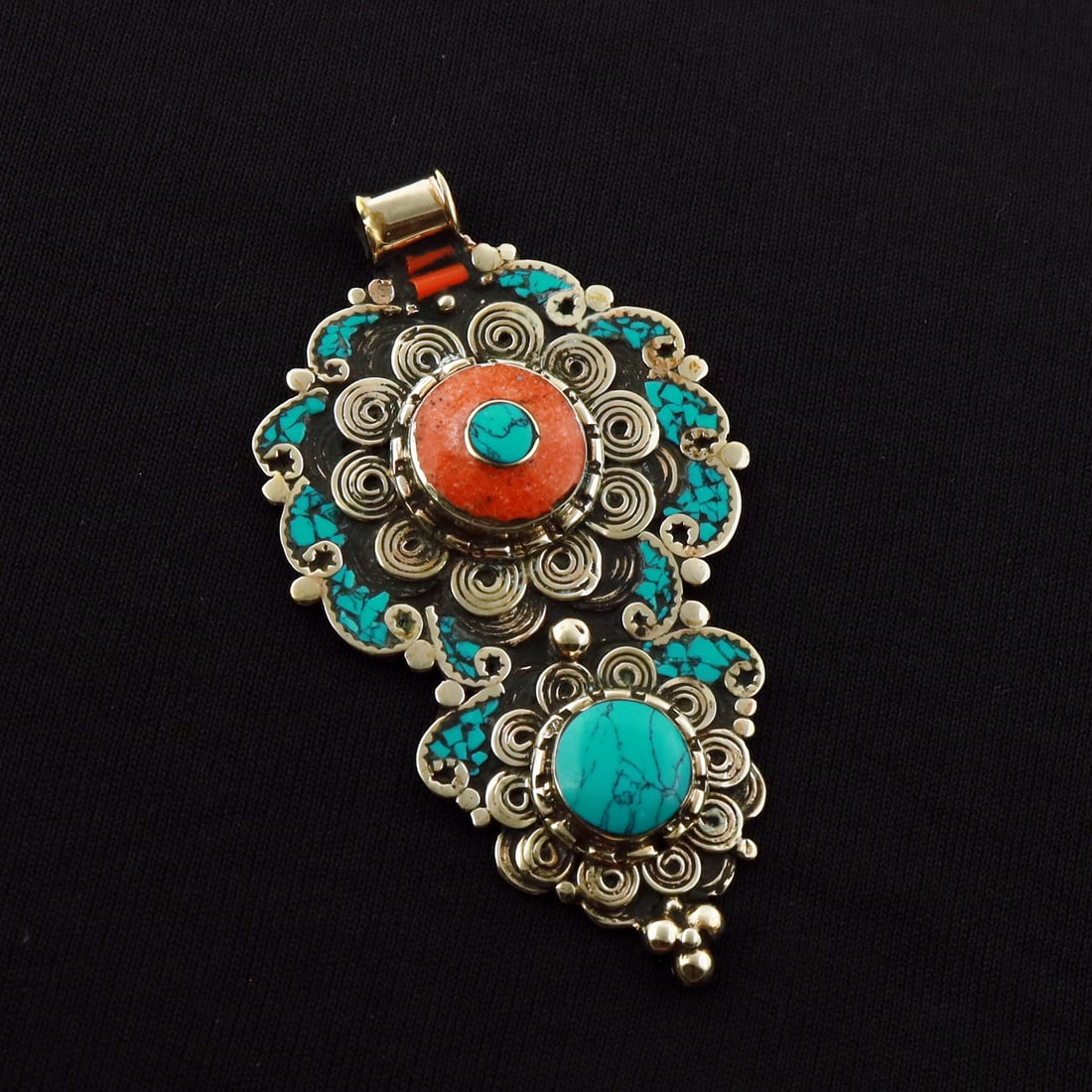 Tibetan Turquoise & Coral Handmade Ethnic Boho Pendant: Product ID: 260721180728 Product - Tibetan Handmade Ethnic Pendant Pendant Size - 8X4 CM Pendant Weight - 26 Gram Gemstone - Turquoise & Coral Metal - Brass & Copper mix Metal Origin - Nepal Country/R