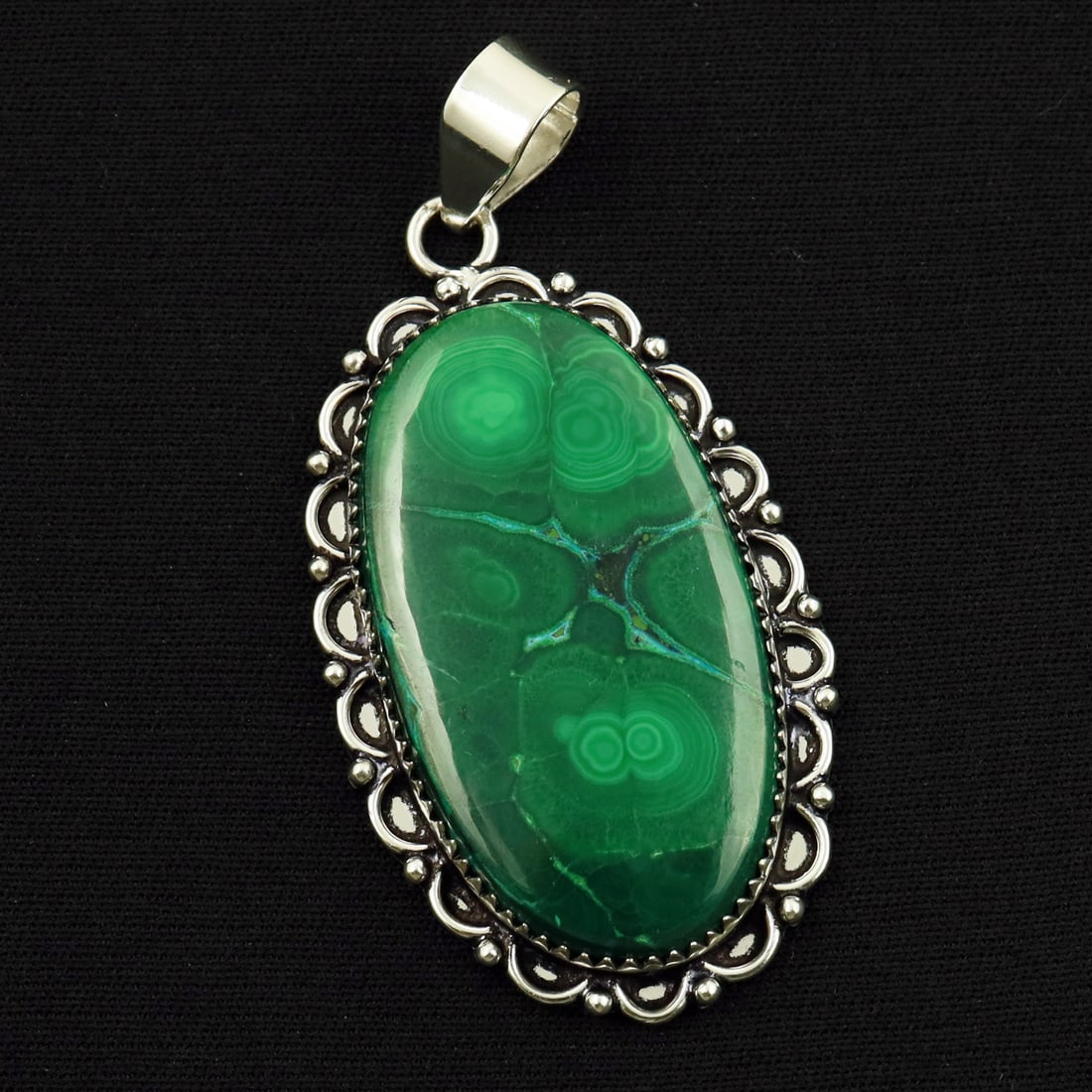 Natural Malachite Sterling Silver Plated Handmade Pendant: Product ID: 260714161925 Product - Handmade Silver Plated Pendant Metal - 92.5 Sterling Silver Plated Pendant Size - 4.5x2.5 CM Gemstone - Malachite Gemstone Origin - Democratic Republic of Congo Gems