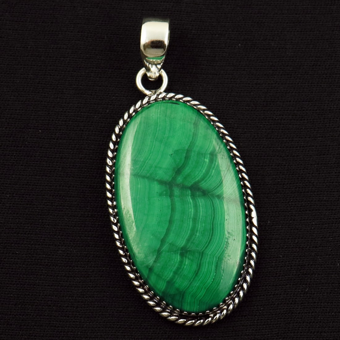 Natural Malachite Sterling Silver Plated Handmade Pendant: Product ID: 260714162010 Product - Handmade Silver Plated Pendant Metal - 92.5 Sterling Silver Plated Pendant Size - 4x2.5 CM Gemstone - Malachite Gemstone Origin - Democratic Republic of Congo Gemsto