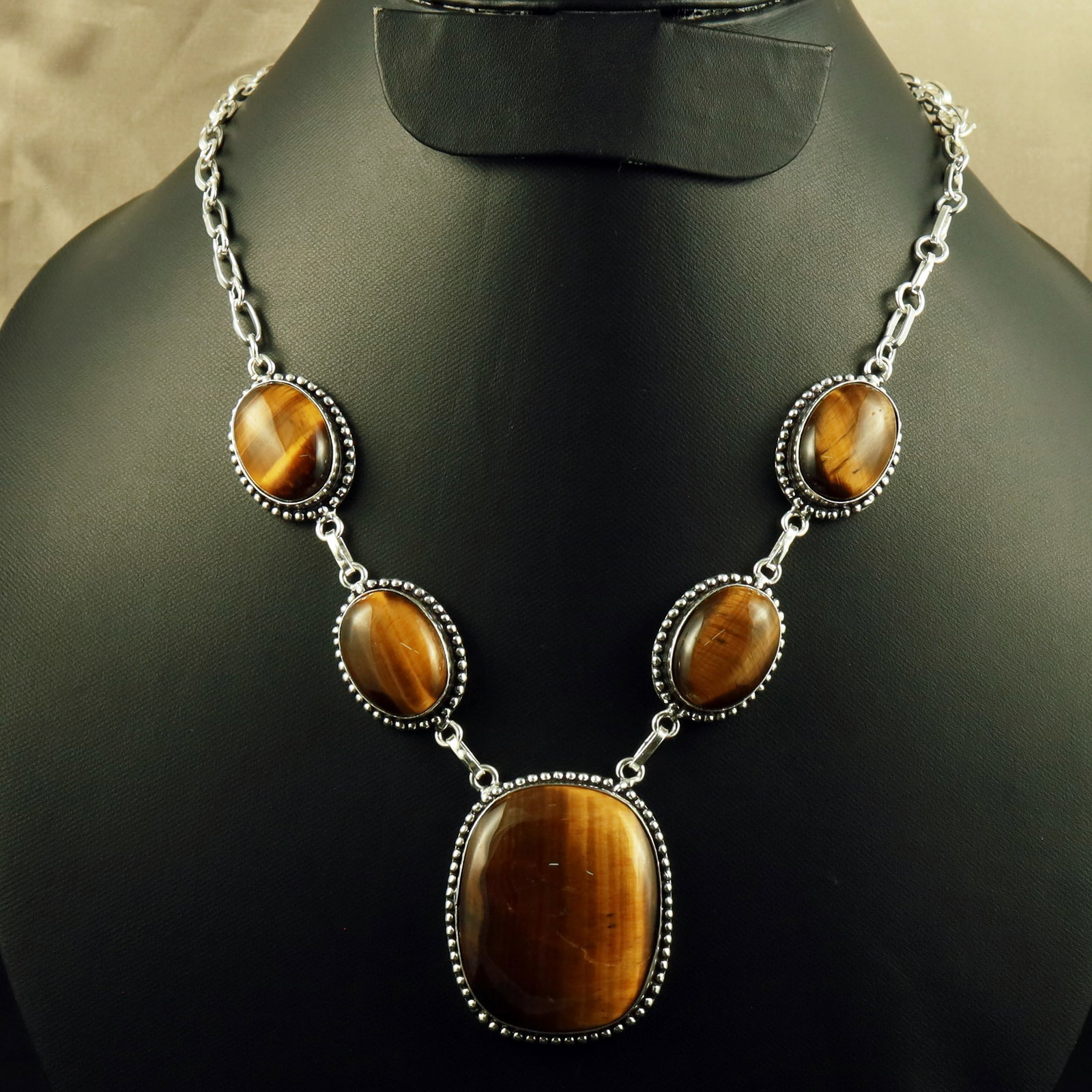Natural Tiger Eye Sterling Silver Plated Handmade Necklace: Product ID: 260701150249 Product - Handmade Silver Plated Necklace Metal - 92.5 Sterling Silver Plated Necklace Length - 18 Inch Gemstone - Tiger Eye Gemstone Size - 2X1.5 CM (4 Stone), 4X3 CM (1 Ston