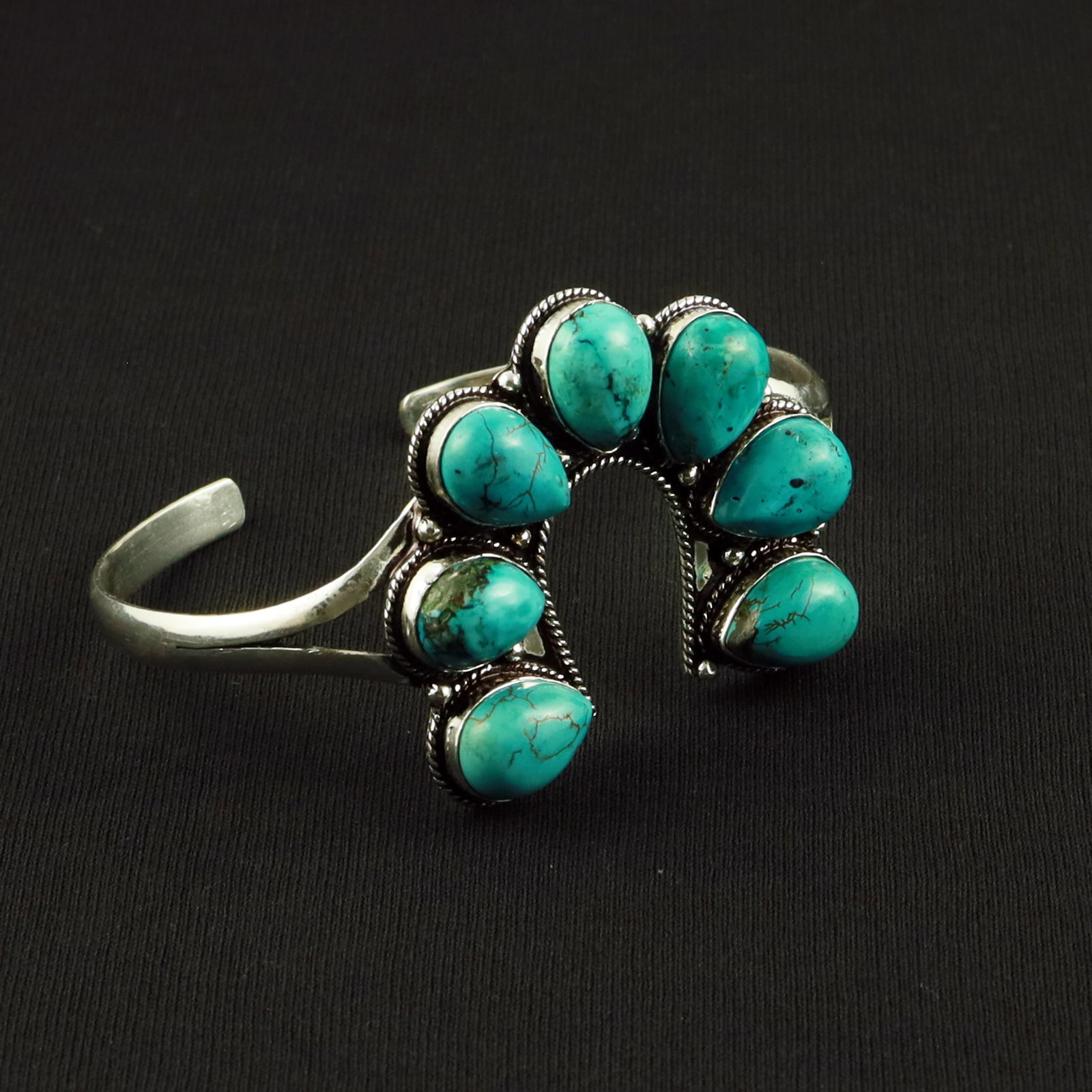 Natural Turquoise Sterling Silver Plated Handmade Cuff Bangle: Product ID: 260617113408 Product - Handmade Silver Plated Cuff Bangle Metal - 92.5 Sterling Silver Plated Bangle Size - 7.5x5 CM (Adjustable) Gemstone - Turquoise Gemstone Origin - Tibet Gemstone Size