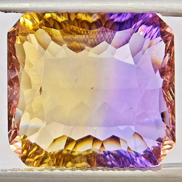 Natural Bi Color Ametrine Gemstones 8.94 Ct. Octagon Concave Cut 13.5 x 12.5 Mm.: Product ID: 800408545 Product Name: Natural Ametrine Weight: 8.94 CT. Size: 13.5 x 12.5 x 7.1 MM. Shape: Octagon Concave Cut Color: Bi Color Clarity:VVS - VSI Luster: Very Good Gems Origin: Bolivia Tr