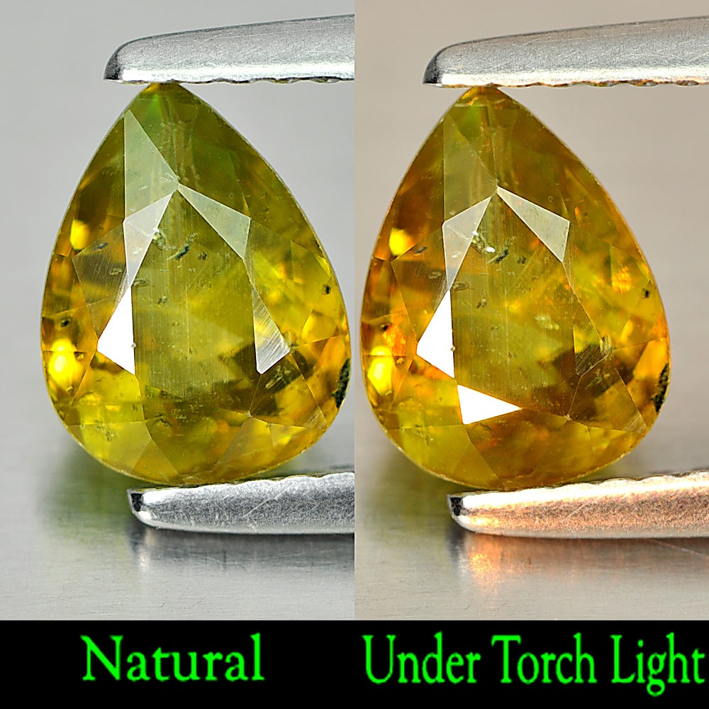 Natural Multi Color Titanium Sphene Gemstones Rainbow Spark 1.39 Ct. Pear Shape 8.2 x 6.2 Mm.: Product ID: 806507796 Product Name: Natural Sphene Weight: 1.39 CT. Size: 8.2 x 6.2 x 3.8 MM. Shape: Pear Color: Multi Color With Rainbow Spark Clarity:VSI Luster: Good Gems Origin: Madagascar Treatme