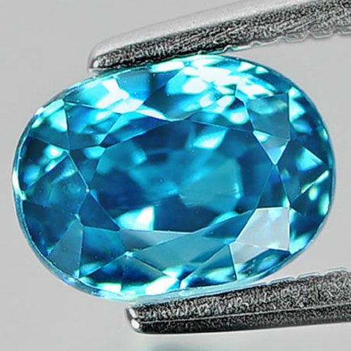Natural Blue Zircon Gemstones 2.18 Ct. Oval Shape 7.6 x 5.3 Mm.: Product ID: 807728105 Product Name: Natural Zircon Weight: 2.18 CT. Size: 7.6 x 5.3 x 5.2 MM. Shape: Oval Color: Blue Clarity:VVS Luster: Very Good Gems Origin: Cambodia Treatment: Heated Crystal Stru