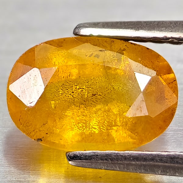 Natural Yellow Sapphire Gemstones 1.45 Ct. Oval Shape 8.2 x 5.6 Mm.: Product ID: 806162578 Product Name: Natural Yellow Sapphire Weight: 1.45 CT. Size: 8.2 x 5.6 x 3.5 MM. Shape: Oval Color: Yellow Clarity:VSI - SI1 Luster: Good Gems Origin: Thailand Treatment: Heated 