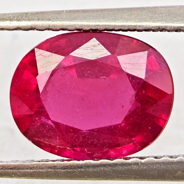 Natural Purplish Red Ruby Gemstones 2.95 Ct. Oval Shape 9.3 x 7.3 Mm.: Product ID: 805935651 Product Name: Natural Ruby Weight: 2.95 CT. Size: 9.3 x 7.3 x 4.6 MM. Shape: Oval Color: Purplish Red Clarity:VSI Luster: Good Gems Origin: Madagascar Treatment: Heated (Lead-gla