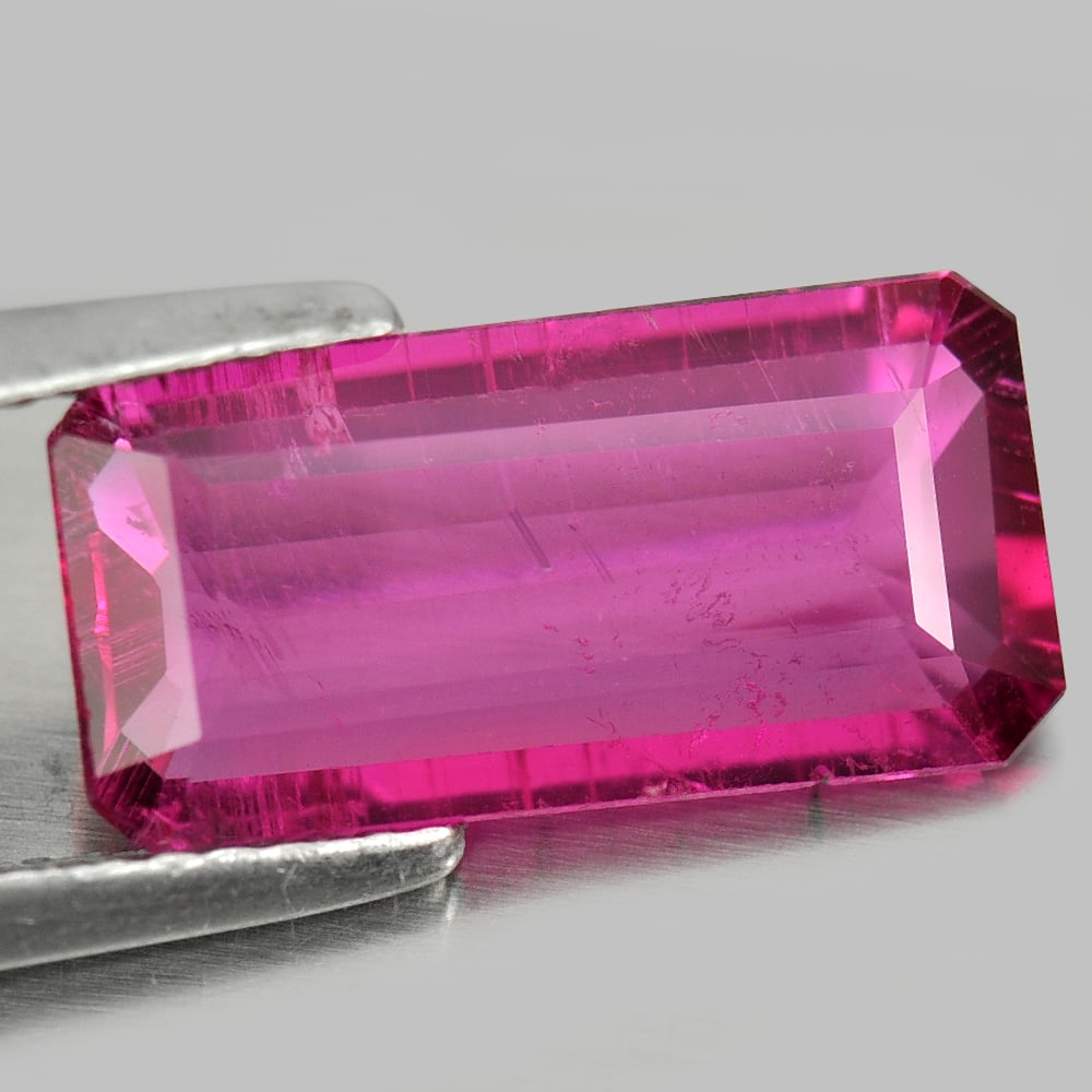 Natural Purplish Pink Rubellite Gemstones 2.75 Ct. Octagon Shape 14 x 7 Mm.: Product ID: 805800422 Product Name: Natural Rubellite Weight: 2.75 CT. Size: 14 x 7 x 3.1 MM. Shape: Octagon Color: Pink Clarity:SI Luster: Good Gems Origin: Nigeria Treatment: Unheated Crystal Struct