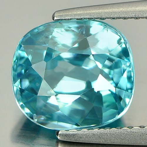 Natural Blue Zircon Gemstones 4.67 Ct. Cushion Shape 9.1 x 8.2 Mm.: Product ID: 807727425 Product Name: Natural Zircon Weight: 4.67 CT. Size: 9.1 x 8.2 x 5.8 MM. Shape: Cushion Color: Blue Clarity:VSI Luster: Very Good Gems Origin: Cambodia Treatment: Heated Crystal S