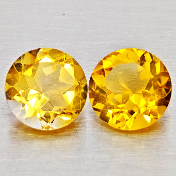 Natural Yellow Citrine Gemstones 2.51 Ct. 2 Pcs. Round Shape 7.1 Mm.: Product ID: 801815378 Product Name: Natural Citrine Weight: 2.51 CT. Size: 7.1 x 7.1 x 5.3 MM. Shape: Round Shape Color: Yellow Clarity:VSI - SI1 Luster: Good Gems Origin: Brazil Treatment: Unheated C