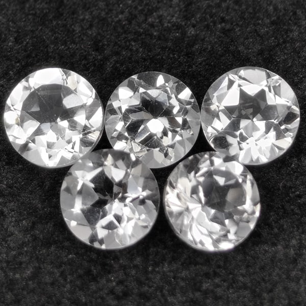 Natural White Topaz Gemstones 5.31 Ct. 5 Pcs. Round Shape 6.2 Mm.: Product ID: 807168784 Product Name: Natural Topaz Weight: 5.31 CT. Size: 6.2 x 6.2 x 4 MM. Shape: Round Color: White Clarity:VSI Luster: Good Gems Origin: Brazil Treatment: Unheated Crystal Structure: