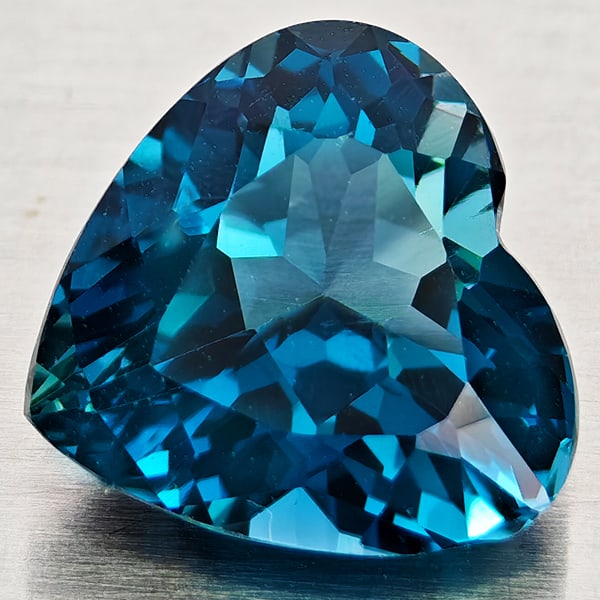 Natural London Blue Topaz Gemstones 5.10 Ct. Heart Shape 10 x 9.5 Mm.: Product ID: 807168386 Product Name: Natural Blue Topaz Weight: 5.10 CT. Size: 10 x 9.5 x 6 MM. Shape: Heart Shape Color: London Blue Clarity:VVS - VSI Luster: Good Gems Origin: Brazil Treatment: Treat