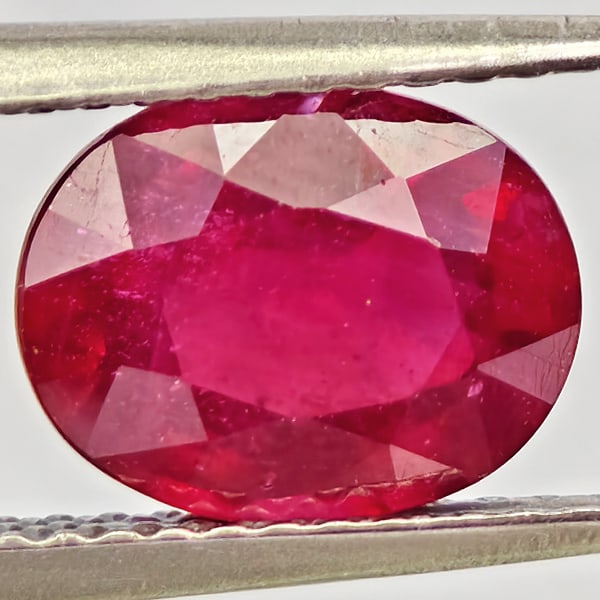 Natural Purplish Red Ruby Gemstones 2.63 Ct. Oval Shape 9 x 7.1 Mm.: Product ID: 805935607 Product Name: Natural Ruby Weight: 2.63 CT. Size: 9 x 7.1 x 4.7 MM. Shape: Oval Color: Purplish Red Clarity:VSI Luster: Good Gems Origin: Madagascar Treatment: Heated (Lead-glass