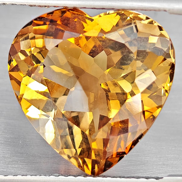 Natural Imperial Topaz Gemstones 13.55 Ct. Heart Shape 15 x 14.9 Mm.: Product ID: 807168612 Product Name: Natural Topaz Weight: 13.55 CT. Size: 15 x 14.9 x 9 MM. Shape: Heart Shape Color: Imperial Clarity:VSI Luster: Good Gems Origin: Brazil Treatment: Treated Crystal S