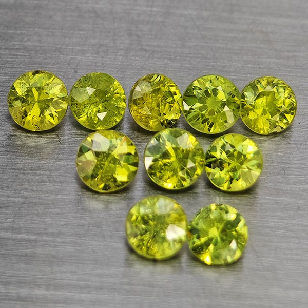 Natural Green Demantiod Garnet Gemstones 1.52 Ct. 10 Pcs. Round Diamond Cut 3.3 Mm.: Product ID: 802937656 Product Name: Natural Demantoid Weight: 1.52 CT. Size: 3.3 x 3.3 x 2.3 MM. Shape: Round Diamond Cut Color: Green Clarity:SI1 Luster: Good Gems Origin: Madagascar Treatment: Unhea