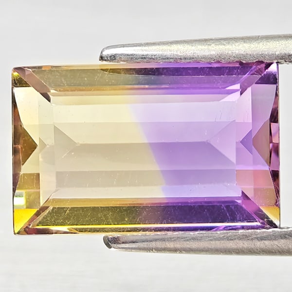 Natural Bi Color Ametrine Gemstones 3.42 Ct. Octagon Shape 11 x 7.1 Mm.: Product ID: 800408415 Product Name: Natural Ametrine Weight: 3.42 CT. Size: 11 x 7.1 x 5.3 MM. Shape: Octagon Color: Bi Color Clarity:VSI - SI1 Luster: Good Gems Origin: Bolivia Treatment: Unheated Cr