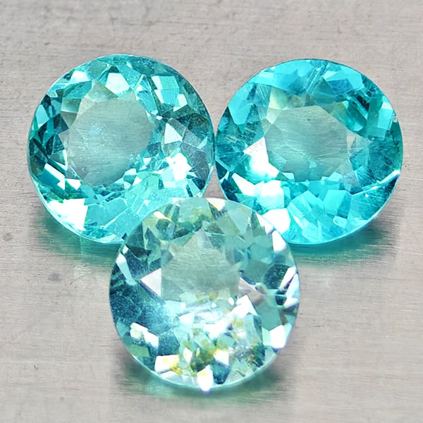 Natural Paraiba Color Apatite Gemstones 1.33 Ct. 3 Pcs. Round Shape 5 Mm.: Product ID: 800613642 Product Name: Natural Apatite Weight: 1.33 CT. Size: 5 x 5 x 2.9 MM. Shape: Round Color: Neon Blue Clarity:SI1 Luster: Good Gems Origin: Tanzania Treatment: Unheated Crystal Stru