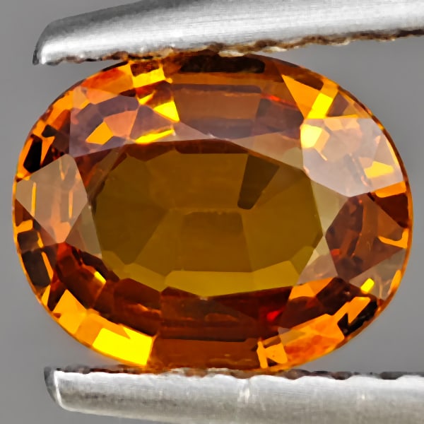 Natural Orange Spessartine Garnet 0.94 Ct. Oval Shape 9.2 x 6 Mm.: Product ID: 802937840 Product Name: Natural Spessartine Weight: 0.94 CT. Size: 9.2 x 6 x 3.1 MM. Shape: Oval Shape Color: Orange Clarity:VSI Luster: Good Gems Origin: Namibia Treatment: Unheated Cryst