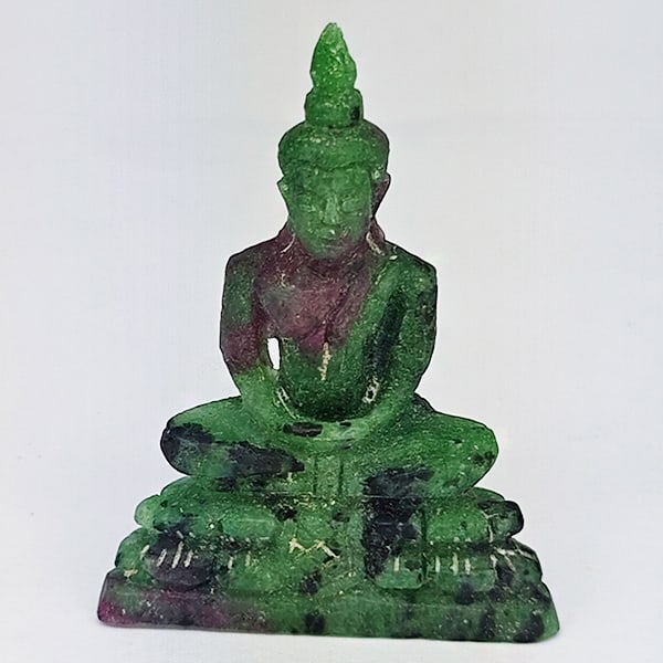 Natural Red Green Ruby in Zoisite Gemstones 61.84 Ct. Buddha Carving Shape 44 x 32 Mm.: Product ID: 805935845 Product Name: Natural Zoisite Carving Weight: 61.84 CT. Size: 44 x 32 x 11 MM. Shape: Carving shape Color: Red Green Clarity:Opaque Luster: Good Gems Origin: Madagascar Treatment