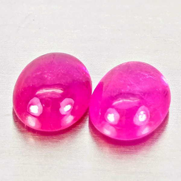 Natural Pink Red Jonson Ruby 1.12 Ct. 2 Pcs. Oval Cabochon Shape 5.2 x 4.2 Mm.: Product ID: 805935702 Product Name: Natural Ruby Weight: 1.12 CT. Size: 5.2 x 4.2 x 2.5 MM. Shape: Oval Cabochon Color: Pink Red Clarity:Semi - Transparent Luster: Good Gems Origin: Mozambique Treatme