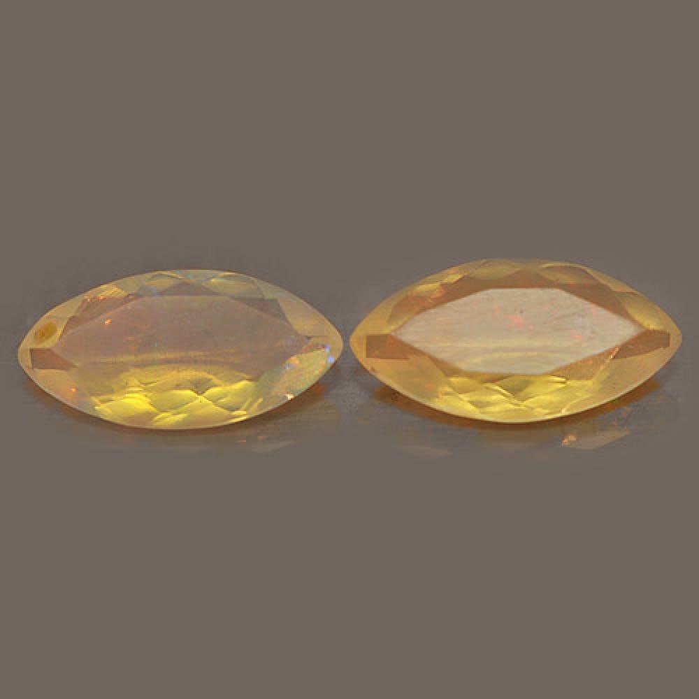 Natural Opal Multi Color Play Of Colour Gemstones 1.68 Ct. Marquise Shape 2 Pcs.: Product ID: 818725579 Product Name: Natural Opal Weight: 1.68 CT. Size: 11.7 x 6 x 3.4 MM. Shape: Marquise Color: Multi-Color Clarity:Semi - Transparent Luster: Iridescent Gems Origin: Ethiopia Treatm