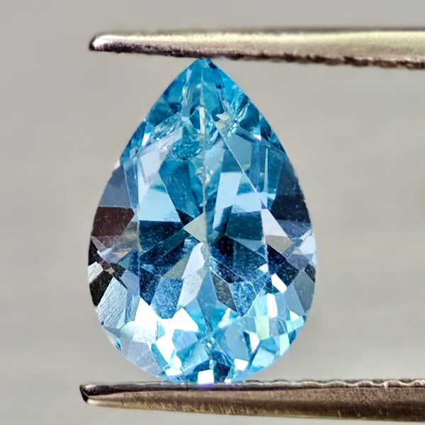 Natural Swiss Blue Topaz Gemstones 2.52 Ct. Pear Shape 10.1 x 7 Mm.: Product ID: 807168015 Product Name: Natural Blue Topaz Weight: 2.52 CT. Size: 10.1 x 7 x 5.3 MM. Shape: Pear Shape Color: Swiss Blue Clarity:VSI - SI1 Luster: Good Gems Origin: Brazil Treatment: Treat
