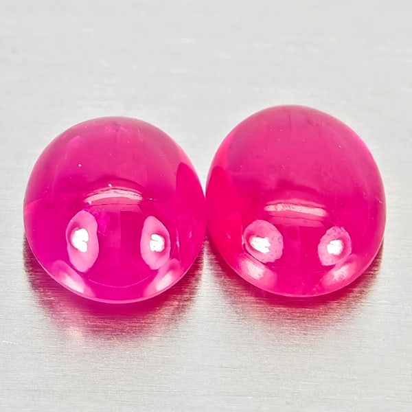 Natural Pink Red Jonson Ruby 1.11 Ct. 2 Pcs. Oval Cabochon Shape 5.2 x 4.2 Mm.: Product ID: 805935707 Product Name: Natural Ruby Weight: 1.11 CT. Size: 5.2 x 4.2 x 2.4 MM. Shape: Oval Cabochon Color: Pink Red Clarity:Semi - Transparent Luster: Good Gems Origin: Mozambique Treatme