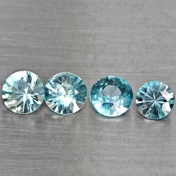 Natural Blue Zircon Gemstones 2.35 Ct. 4 Pcs. Round Diamond Cut and Mixed Size: Product ID: 807743270 Product Name: Natural Gemstones Weight: 2.35 CT. Size: 5.3 x 5.3 x 3.4 to 4.7 x 4.7 x 3 MM. Shape: Round Diamond Cut Color: Blue Clarity:SI1 Luster: Good Gems Origin: Cambodia Tr