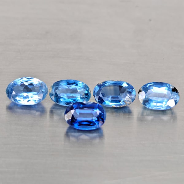 Natural Blue kyanite Gemstones 3.34 Ct. 5 Pcs. Oval Shape and Mixed Size: Product ID: 804204439 Product Name: Natural Kyanite Weight: 3.34 CT. Size: 6.4 x 4.4 x 2.9 to 6.1 x 4.3 x 3.3 MM. Shape: Oval Shape Color: Blue Clarity:VSI - SI1 Luster: Good Gems Origin: Sri - Lanka 