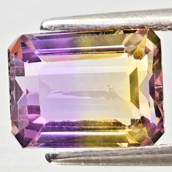 Natural Bi Color Ametrine Gemstones 2.30 Ct. Octagon Shape 8.7 x 6.8 Mm.: Product ID: 800408363 Product Name: Natural Ametrine Weight: 2.30 CT. Size: 8.7 x 6.8 x 5.1 MM. Shape: Octagon Color: Bi Color Clarity:VSI Luster: Good Gems Origin: Bolivia Treatment: Unheated Crystal