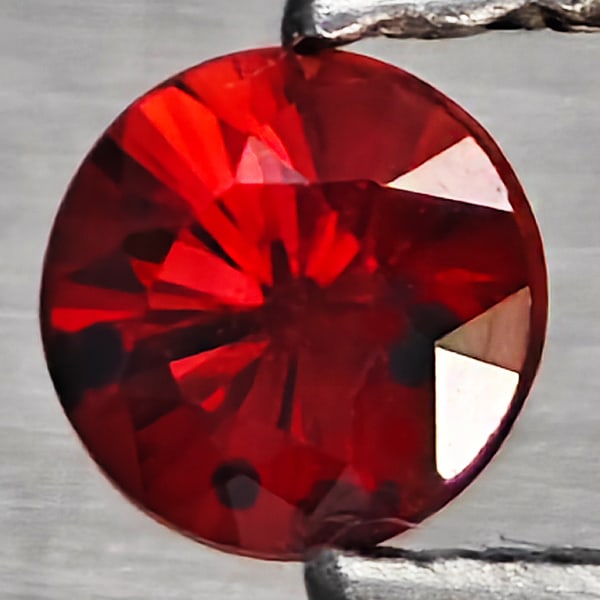 Natural Orangish Red Songea Sapphire Gemstones 0.48 Ct. Round Diamond Cut 3.4 Mm.: Product ID: 806162818 Product Name: Natural Red Sapphire Weight: 0.48 CT. Size: 3.4 x 3.4 x 2.7 MM. Shape: Round Diamond Cut Color: Orangish Red Clarity:SI1 Luster: Good Gems Origin: Tanzania Treatmen