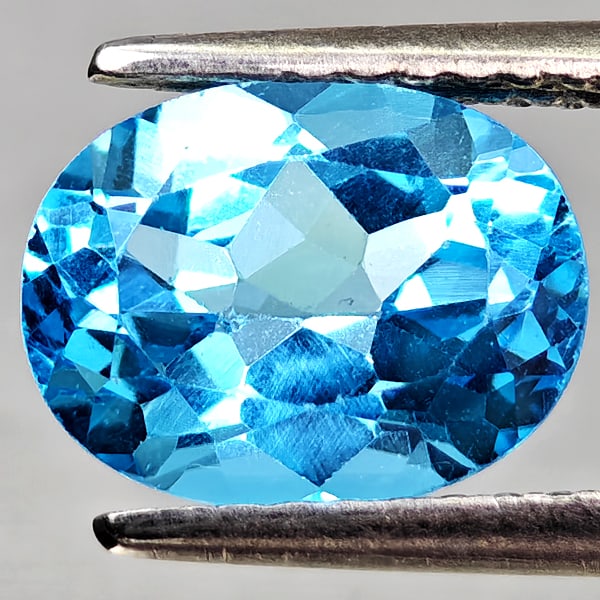 Natural Swiss Blue Topaz Gemstones 2.40 Ct. Oval Shape 9.2 x 7.1 Mm.: Product ID: 807168163 Product Name: Natural Blue Topaz Weight: 2.40 CT. Size: 9.2 x 7.1 x 4.9 MM. Shape: Oval Shape Color: Swiss Blue Clarity:VVS - VSI Luster: Good Gems Origin: Brazil Treatment: Trea